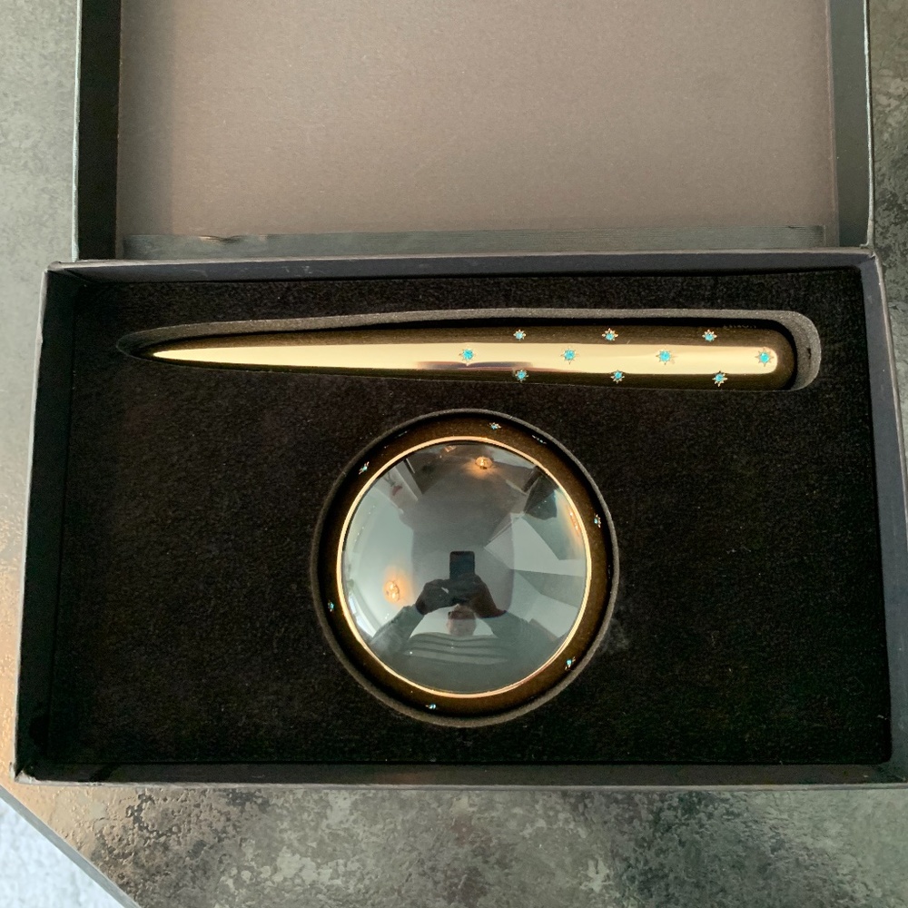 Magnifying glass and letter opener